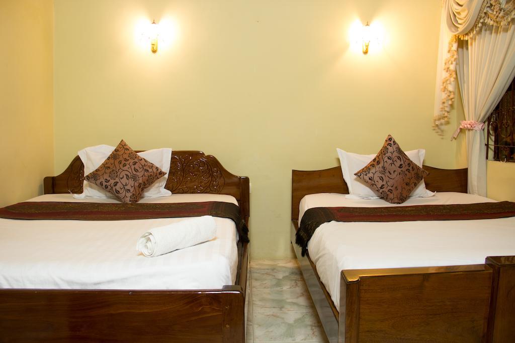 Royal pensión Phnom Penh Habitación foto