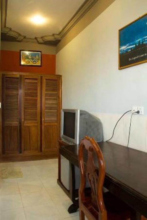 Royal pensión Phnom Penh Habitación foto