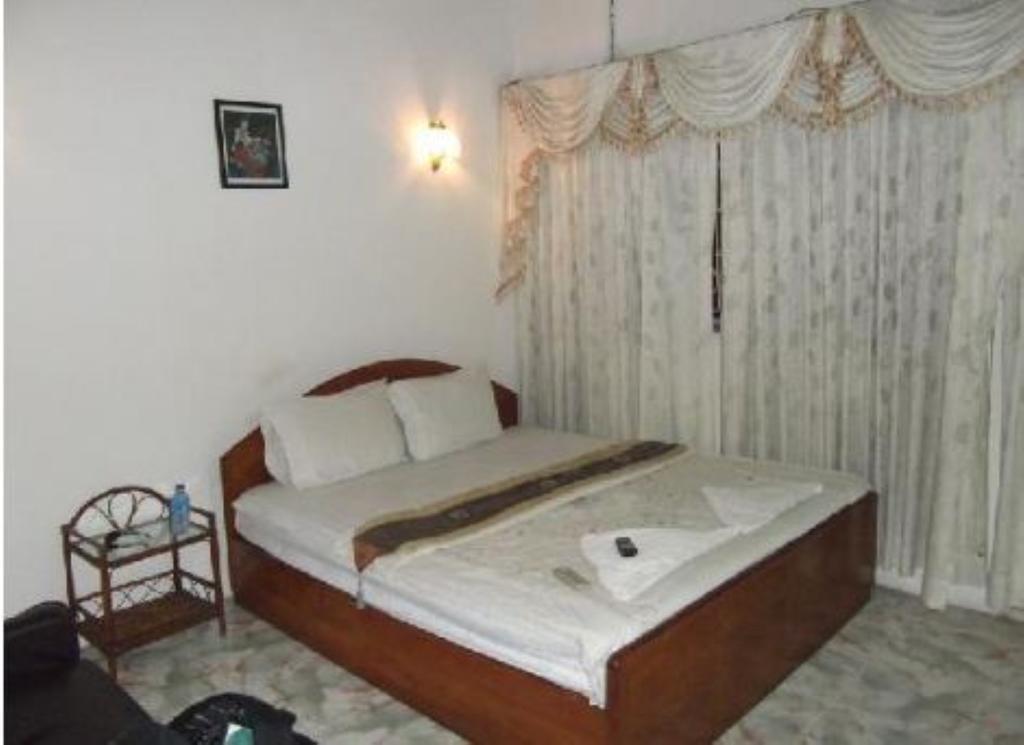 Royal pensión Phnom Penh Habitación foto