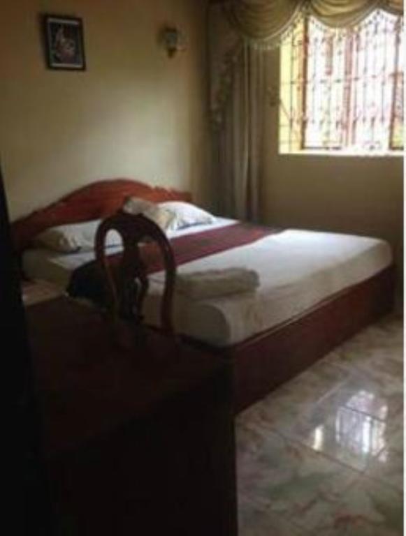 Royal pensión Phnom Penh Habitación foto